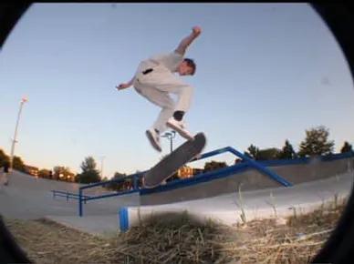 Coach Nate Cowhey skateboarding at sunset
