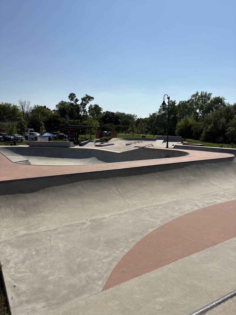 Twiggs Skate Park in Evanston, showing rails, ramps, and a street-style skate course