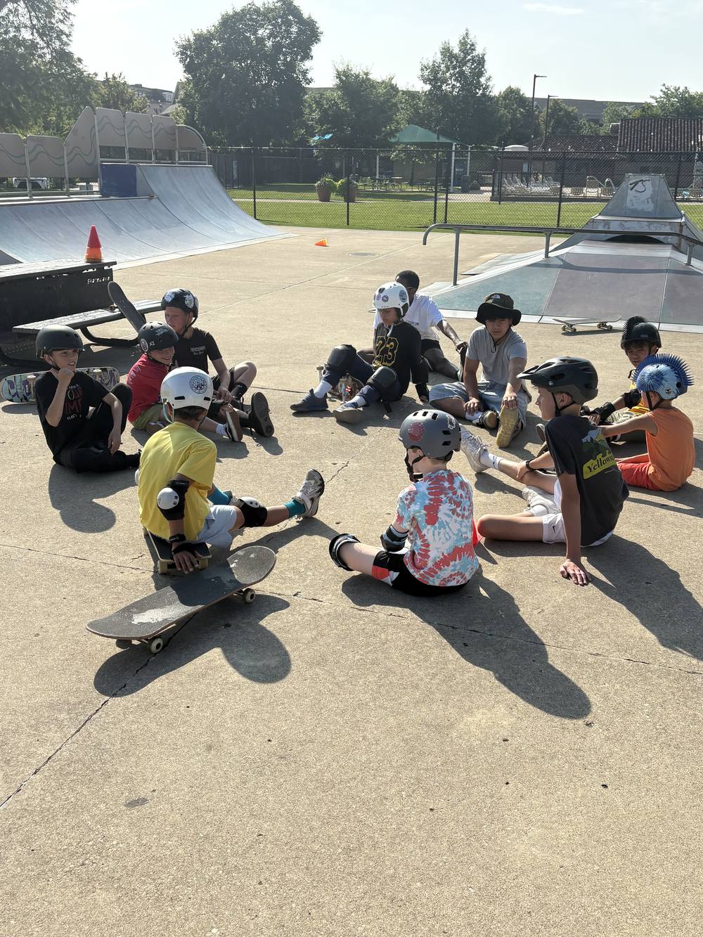 Skate Lessons Chicago summer camp group at Hinkley Skate Park in Park Ridge